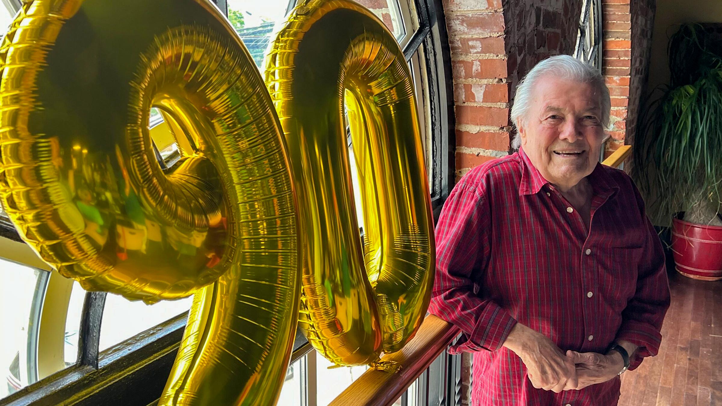 Jacques Pepin and a balloon with the number 90