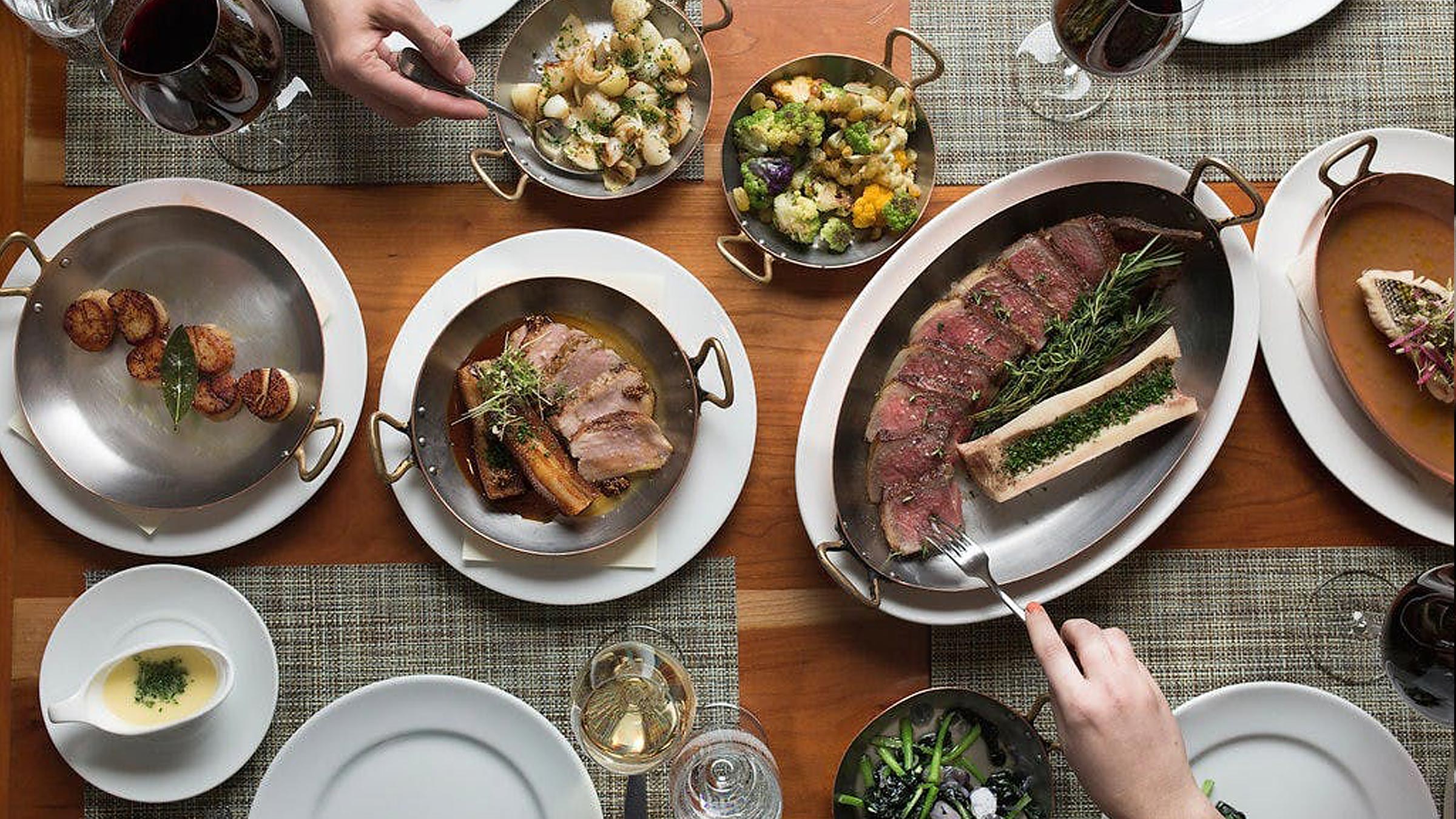 Overhead view of a table full of food at Craft